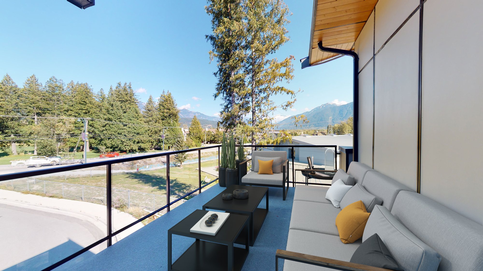 Maplecrest living room with deck views in Pemberton BC